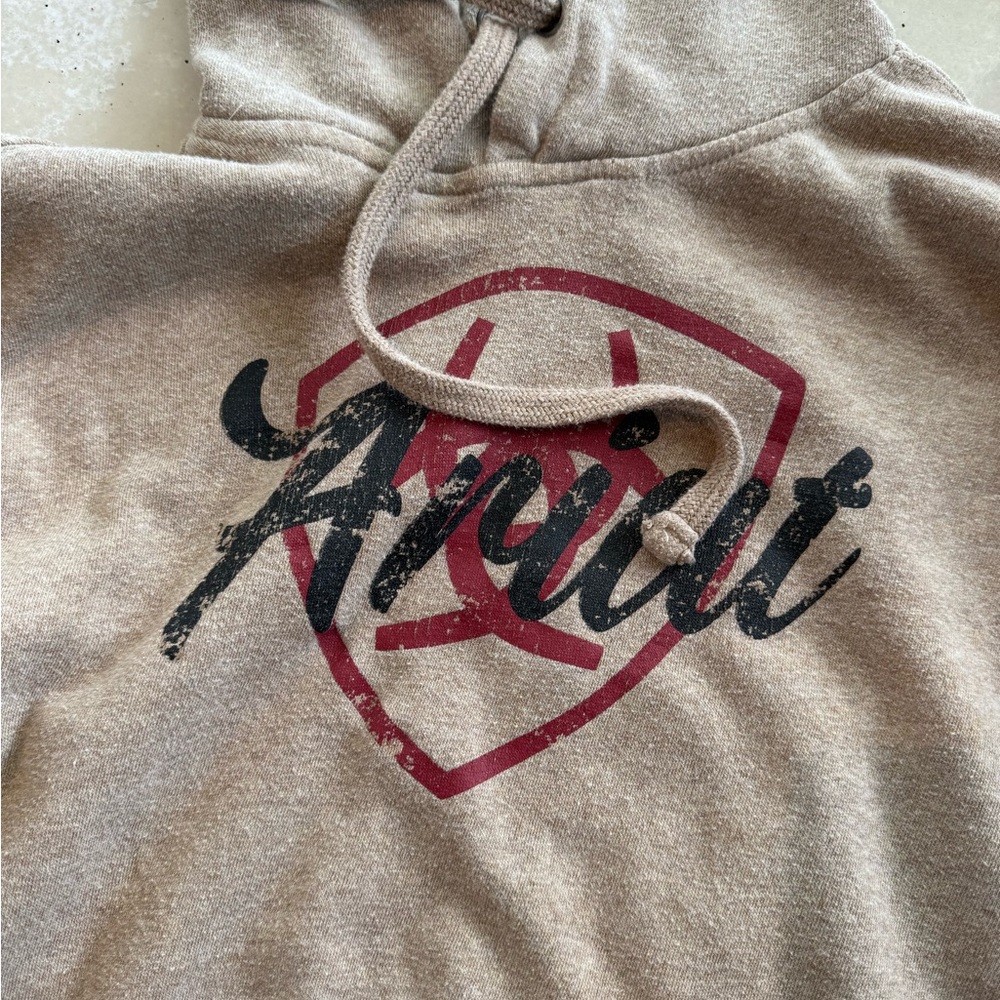 Woman’s XS Ariat hoodie. Tan color, only worn a few times. Perfect condition!